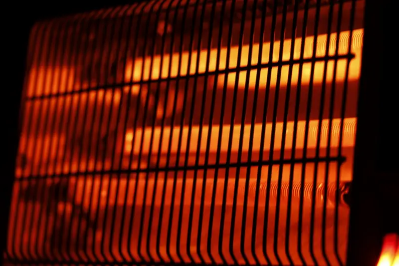 Close-up of a glowing orange heating element